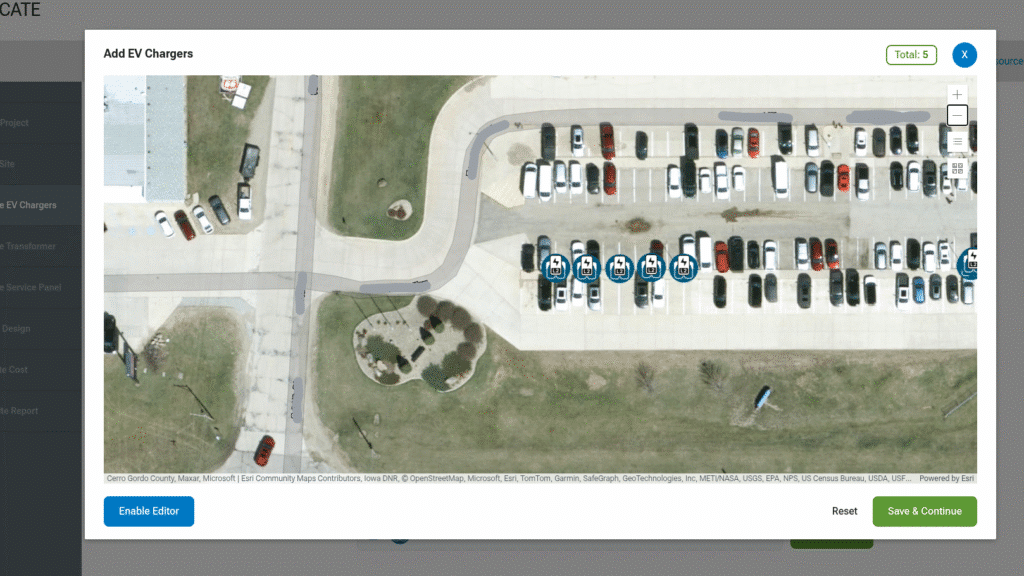A parking lot with cars in it and 5 EV charging pedestals added with the NREL EVI-Locate tool.